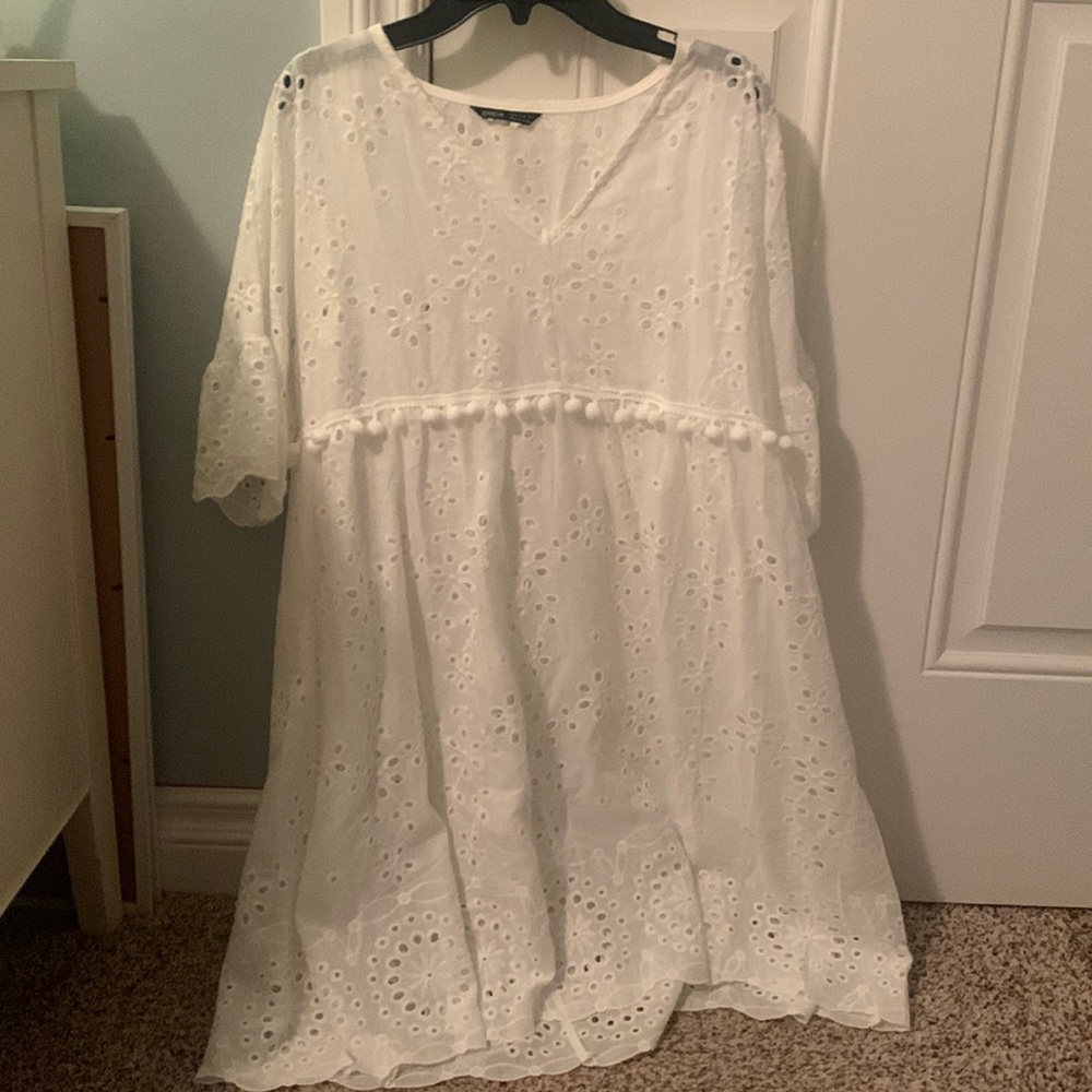 White flowery beach cover up